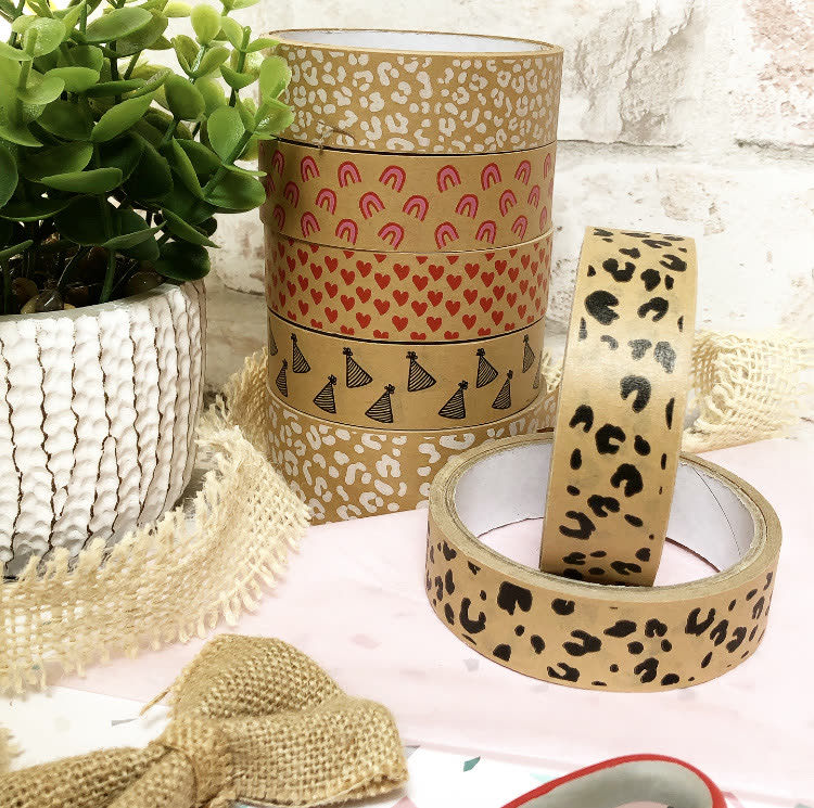 Custom printed tape stack with leopard print, rainbow, heart and party hat designs